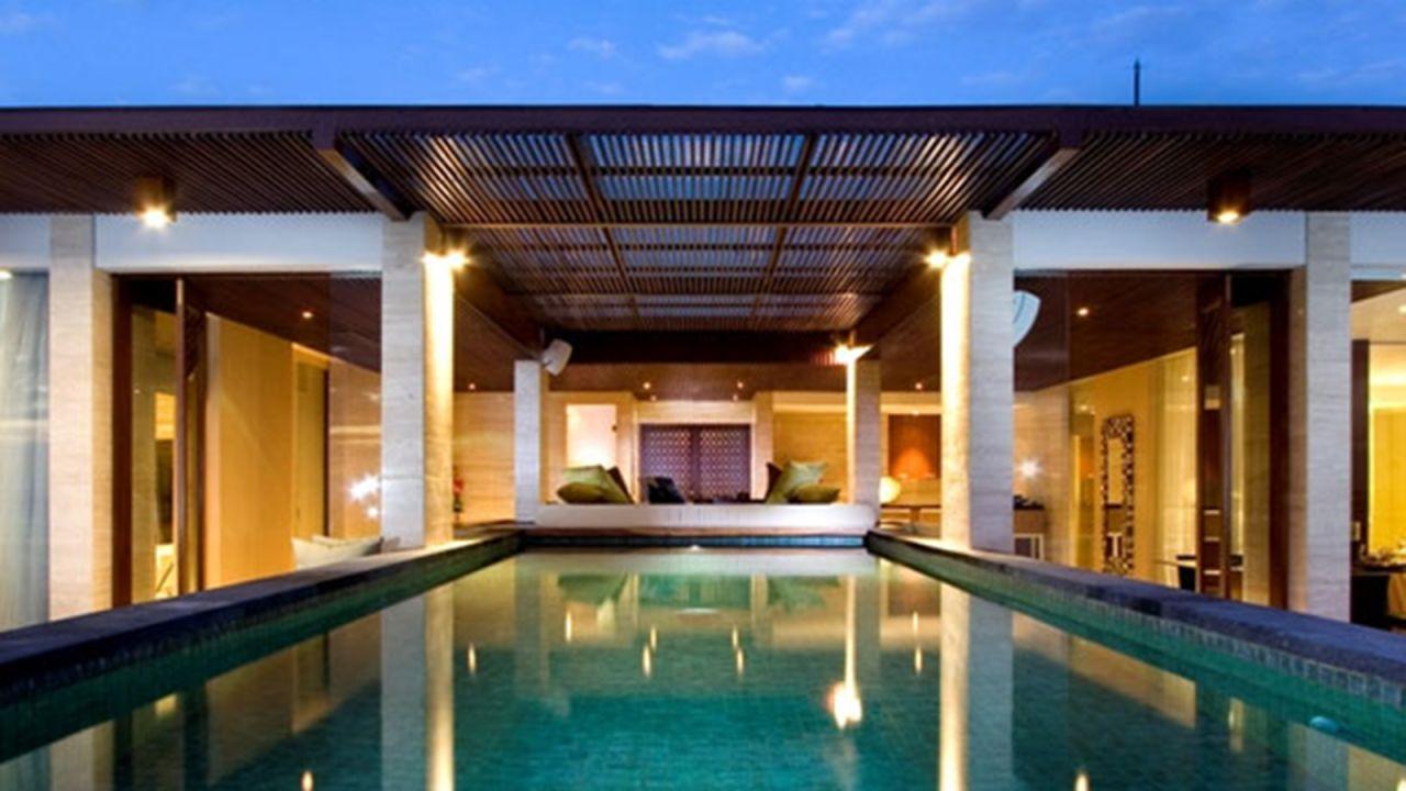 The penthouse suite at Anantara Resort Seminyak puts you at eye-level with the coconut trees.